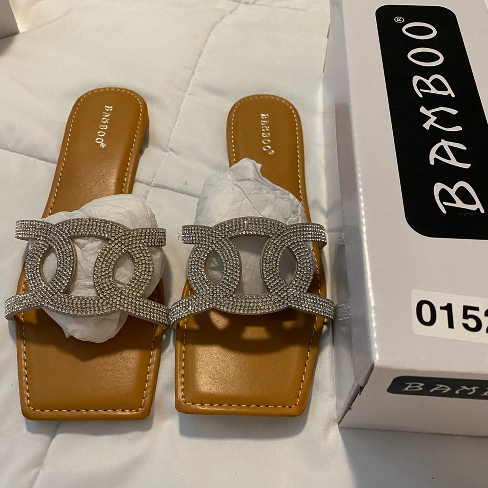 NEW in box, never worn. Bamboo Edge-21 sandal. Size 9 Silver square toe